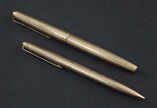 A Parker 9ct gold fountain pen and pencil set